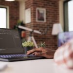 African american engineer programming app code